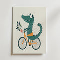 Crocodile on a Bike – stilfullt konsttryck från Bozetto, tryckt på matt finpapper